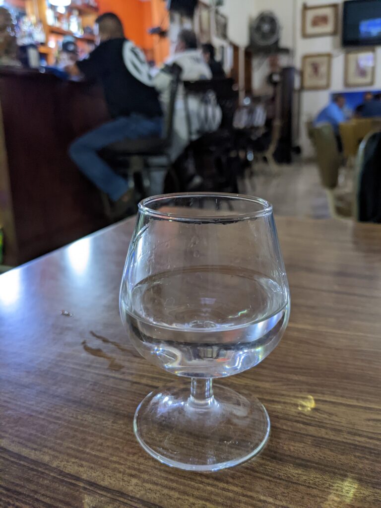 Tequila-blanco-glass-ORG Glass of blanco tequila in Mexican cantina