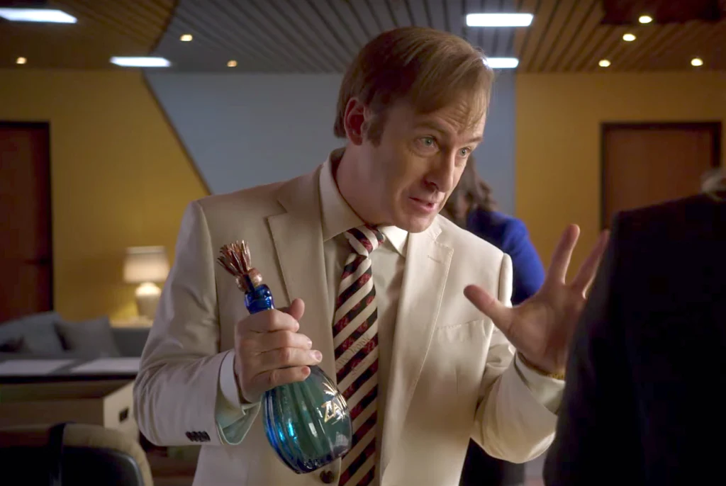 Jimmy McGill from Better Call Saul with bottle of Zafiro Anejo tequila