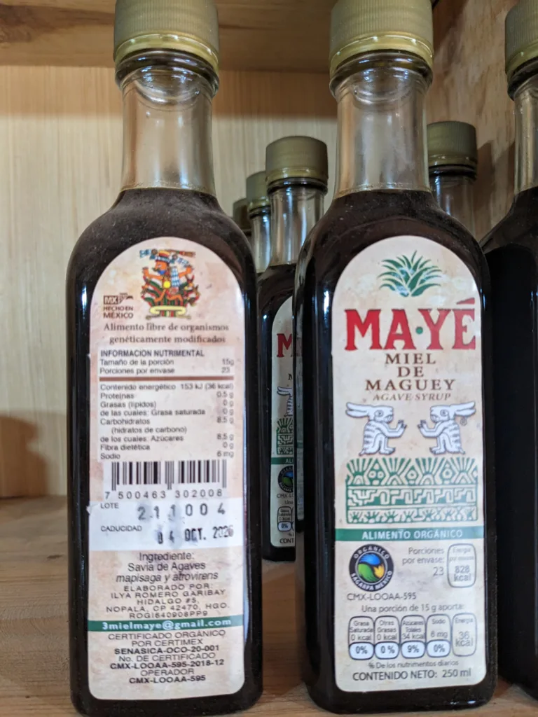 Agave-syrup-Miel-de-Maguey-ORG Bottles of miel de maguey agave syrup, brand MAYE