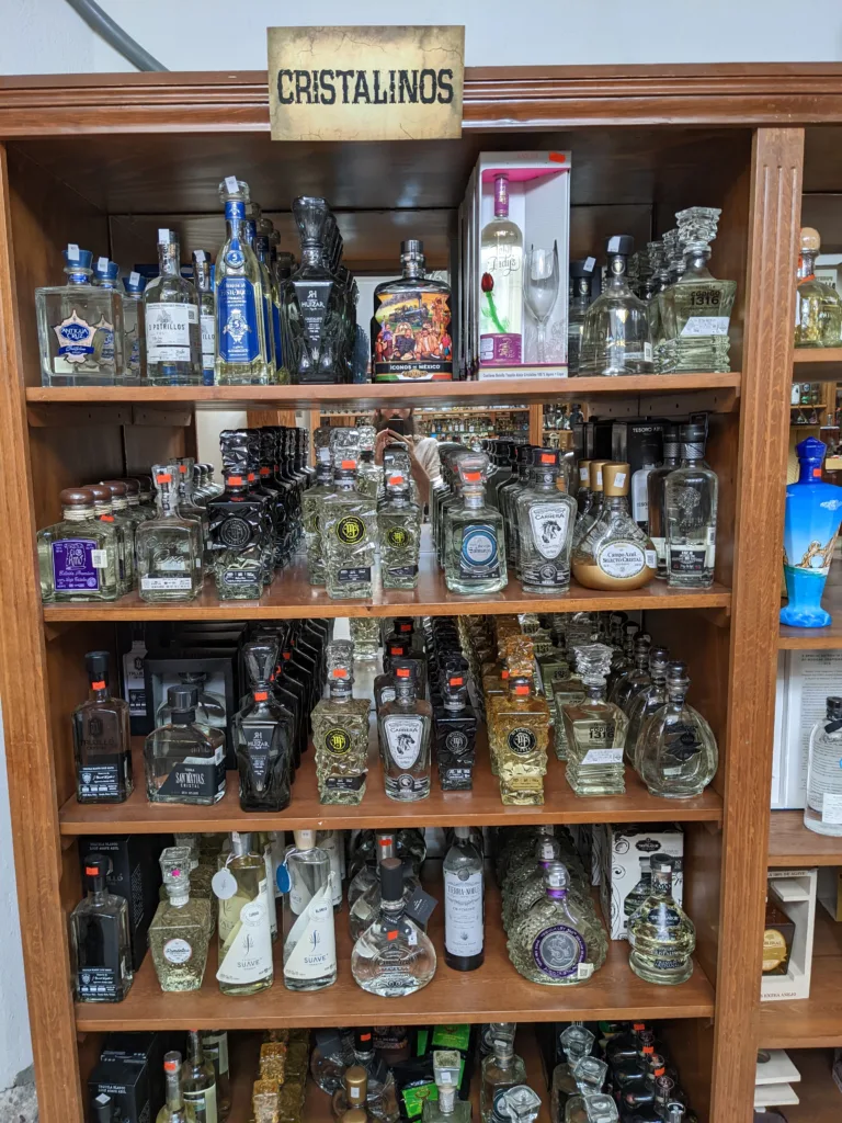 Cristalino tequilas on shelf ORG Bottles of tequila on shop shelves